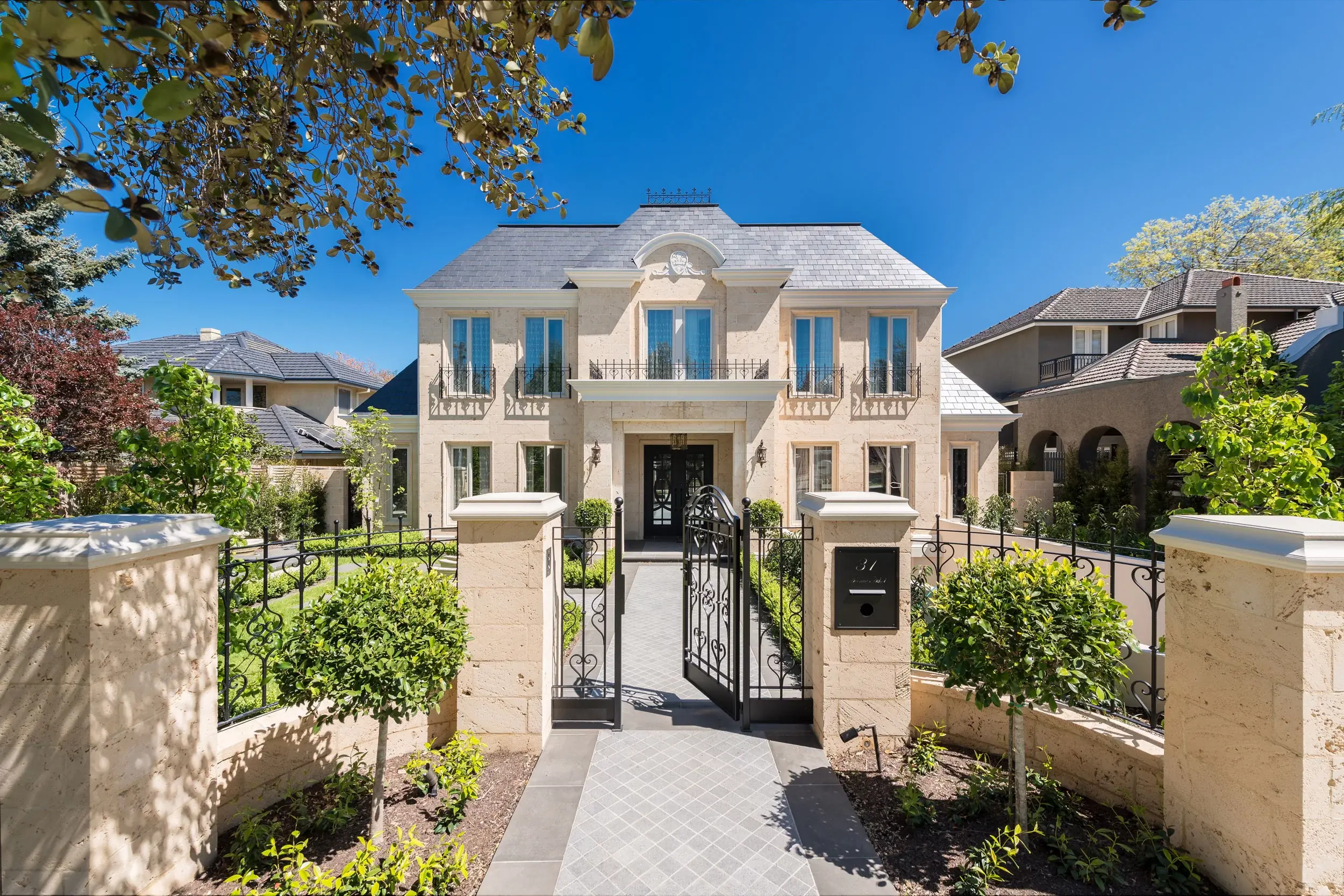A luxury Englehart residence pictured from outside its front gate.